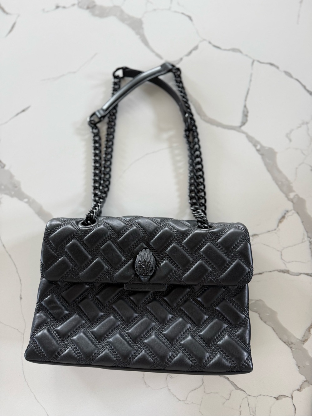 KURT GEIGER LONDON
Kensington Drench Quilted Leather Shoulder Bag